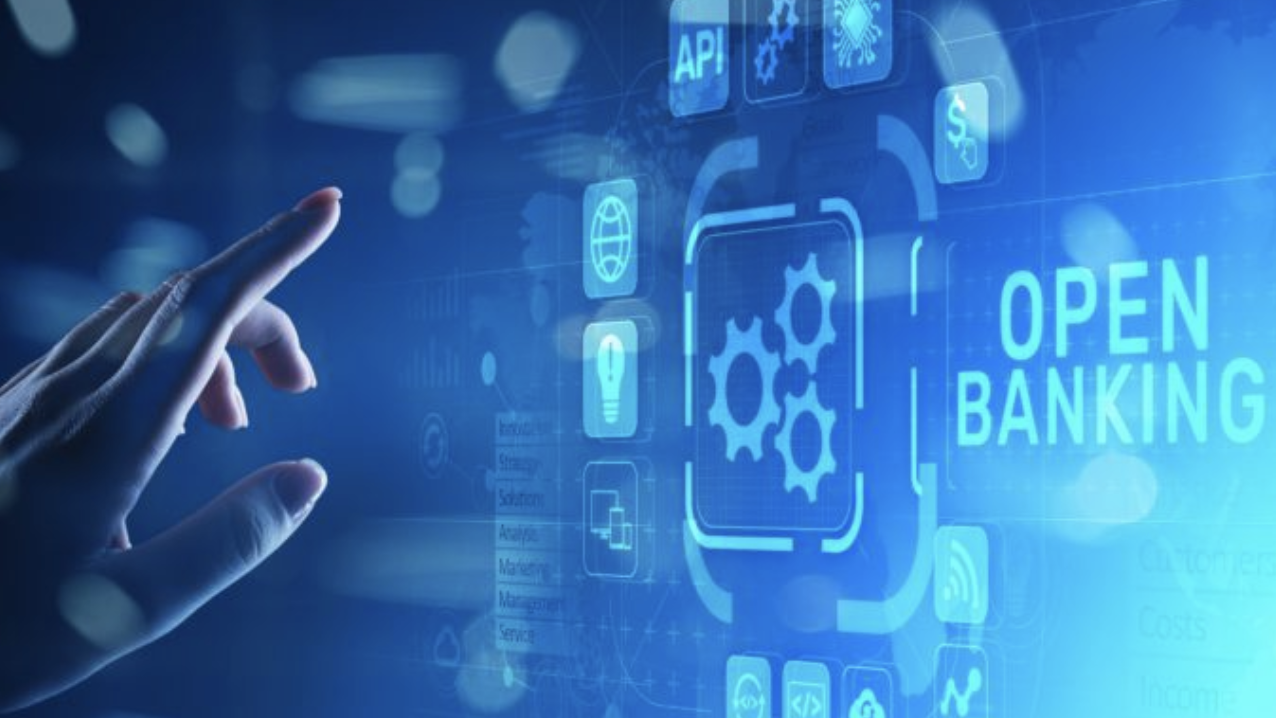 A hand reaching towards a digital interface labelled Open Banking with API and settings icons